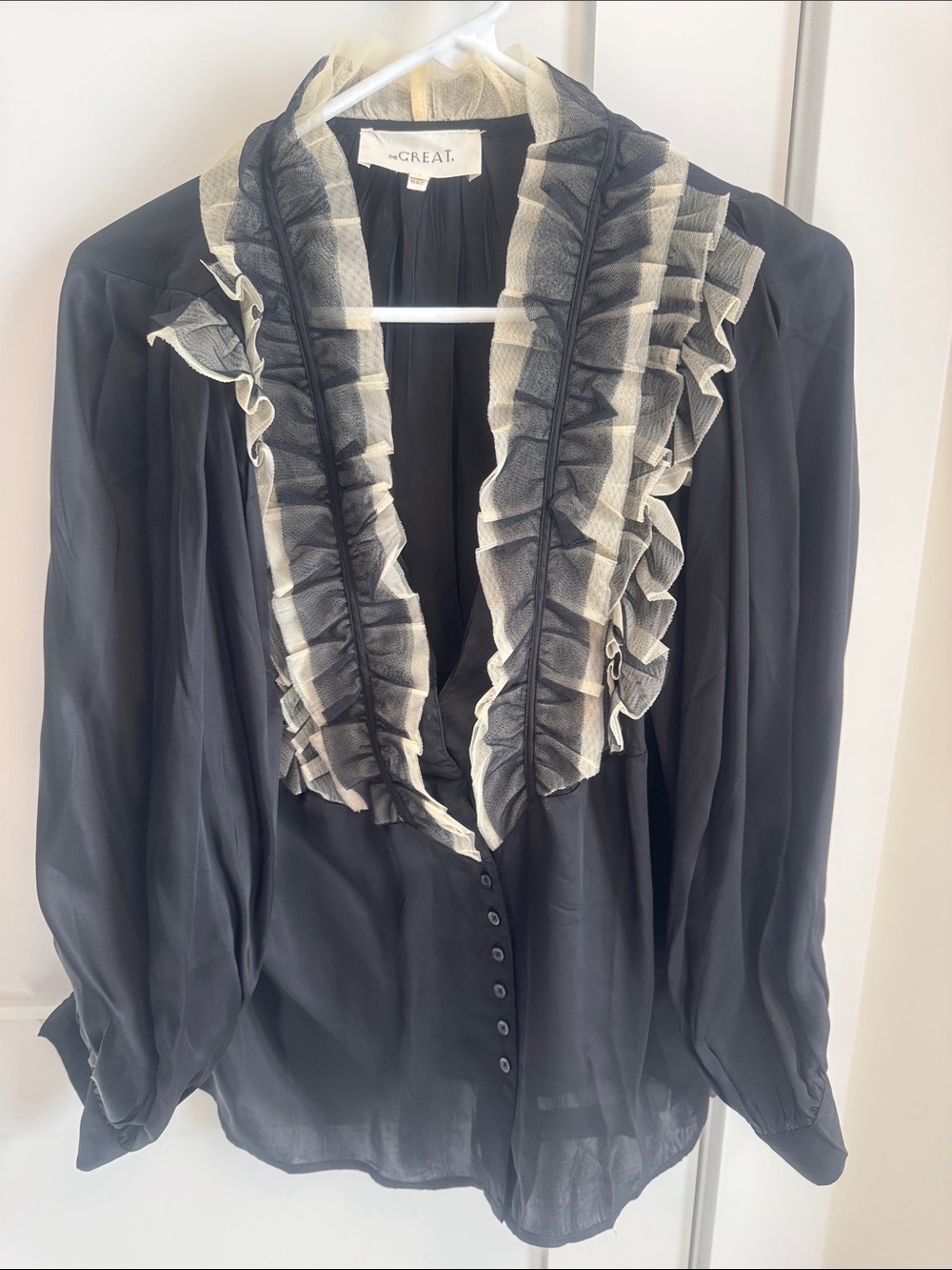 THE GREAT. Black Blouse with Cream Ruffle Trim